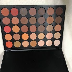 Morphy orange and brown eye shadow pallet